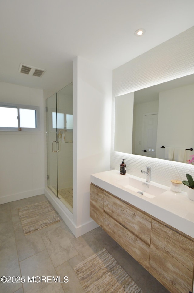 11 Fern Ct, Tinton Falls, NJ 07724 - bathroom with vanity, a stall shower, recessed lighting, baseboards, and tile patterned floors