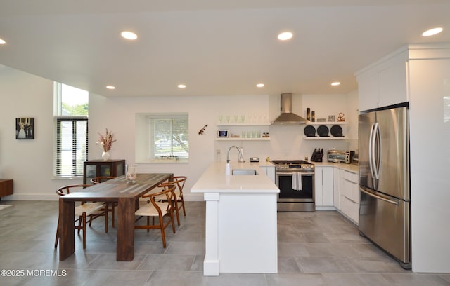 11 Fern Ct, Tinton Falls, NJ 07724 - kitchen with stainless steel appliances, wall chimney exhaust hood, open shelves, a sink, and light countertops
