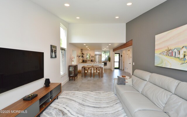 11 Fern Ct, Tinton Falls, NJ 07724 - living area featuring healthy amount of natural light, recessed lighting, baseboards, and light tile patterned floors