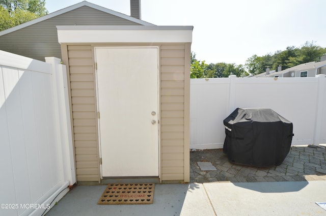 11 Fern Ct, Tinton Falls, NJ 07724 - view of shed featuring a fenced backyard