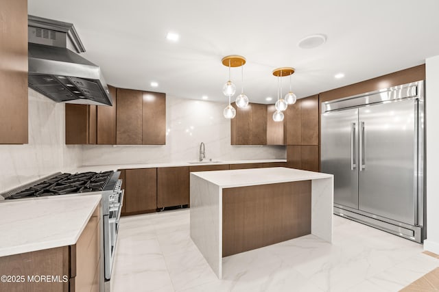 441 Slocum Pl, Oakhurst, NJ 07755 - kitchen featuring appliances with stainless steel finishes, wall chimney exhaust hood, a sink, light marble finish flooring, and recessed lighting