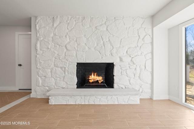 441 Slocum Pl, Oakhurst, NJ 07755 - detailed view of a fireplace, wood finish floors, and baseboards