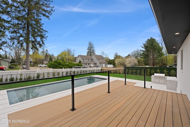 441 Slocum Pl, Oakhurst, NJ 07755 - wooden deck with a fenced backyard, an outdoor kitchen, and a residential view