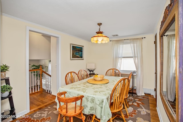 81 Curtis Pl, Manasquan, NJ 08736 - dining space featuring dark wood-style flooring and ornamental molding