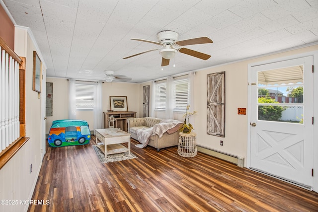 81 Curtis Pl, Manasquan, NJ 08736 - living area featuring a baseboard radiator, wood finished floors, a ceiling fan, and healthy amount of natural light