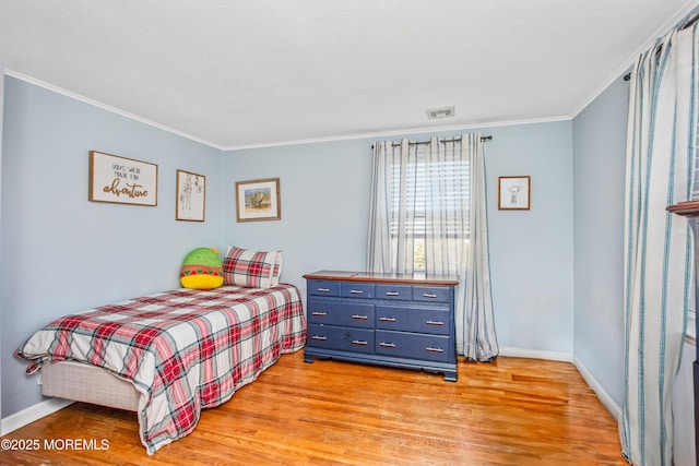 81 Curtis Pl, Manasquan, NJ 08736 - bedroom featuring light wood finished floors, crown molding, and baseboards