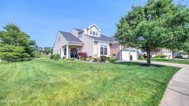 38 Ocean Grove Ln, Waretown, NJ 08758 - view of front of property with concrete driveway, stone siding, and a front lawn