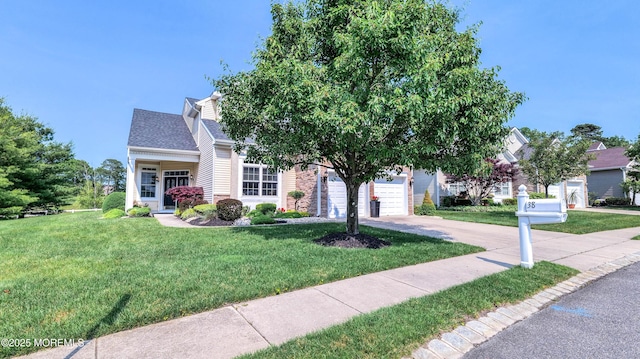 38 Ocean Grove Ln, Waretown, NJ 08758 - obstructed view of property featuring a front yard, concrete driveway, a garage, and a shingled roof