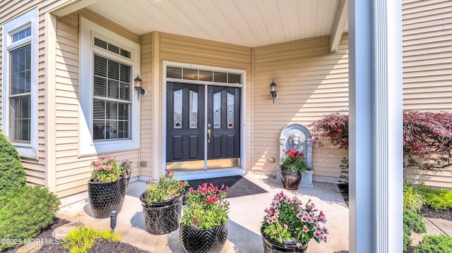 38 Ocean Grove Ln, Waretown, NJ 08758 - doorway to property featuring a porch