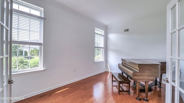 38 Ocean Grove Ln, Waretown, NJ 08758 - sitting room with plenty of natural light, ornamental molding, wood finished floors, and baseboards