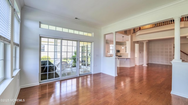 38 Ocean Grove Ln, Waretown, NJ 08758 - unfurnished room featuring decorative columns, crown molding, dark wood finished floors, and baseboards