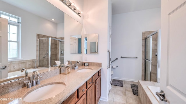 38 Ocean Grove Ln, Waretown, NJ 08758 - bathroom with double vanity, a garden tub, toilet, a shower stall, and tile patterned floors