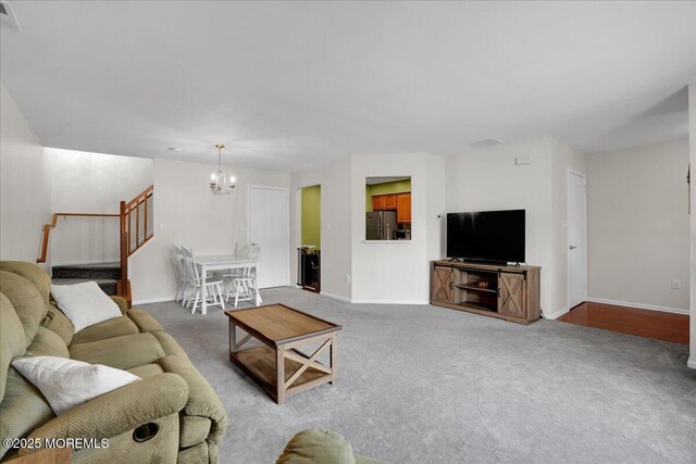 503 Oswego Ct, Mount Laurel, NJ 08054 - living room featuring a chandelier, stairway, and carpet flooring