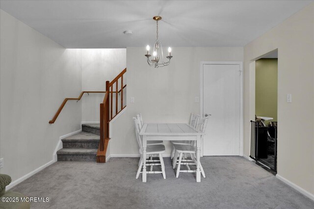 503 Oswego Ct, Mount Laurel, NJ 08054 - carpeted dining space featuring a chandelier and stairway