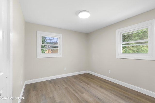 13 Pinehurst Dr, Little Egg Harbor, NJ 08087 - unfurnished room featuring plenty of natural light, wood finished floors, and baseboards