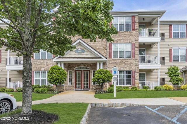113 Sophee Ln, Lakewood, NJ 08701 - view of building exterior with uncovered parking