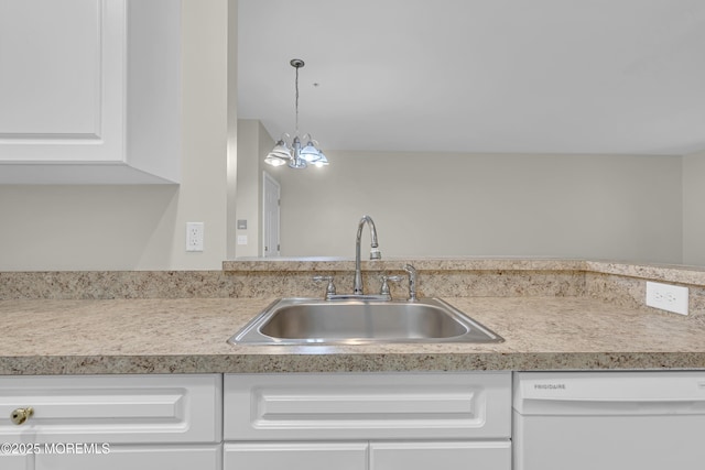 113 Sophee Ln, Lakewood, NJ 08701 - kitchen featuring white dishwasher, a sink, white cabinetry, and light countertops