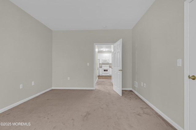 113 Sophee Ln, Lakewood, NJ 08701 - spare room with light carpet and baseboards