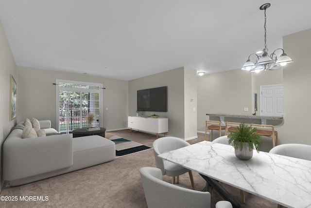 113 Sophee Ln, Lakewood, NJ 08701 - dining area featuring a chandelier and baseboards