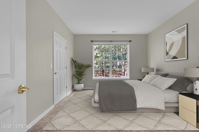 113 Sophee Ln, Lakewood, NJ 08701 - bedroom with baseboards and light colored carpet