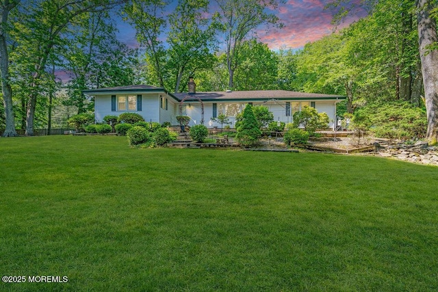 7 E Parkway Pl, Holmdel, NJ 07733 - view of front of property with a yard and a chimney