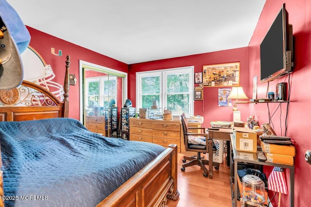 7 E Parkway Pl, Holmdel, NJ 07733 - bedroom with light wood finished floors and an office area