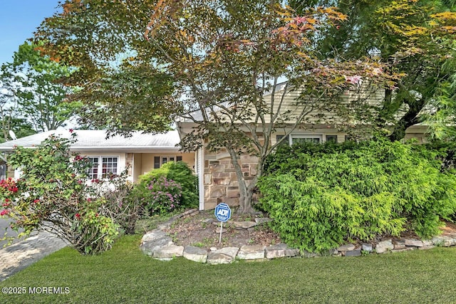 153 Lloyd Rd, Matawan, NJ 07747 - obstructed view of property with a front lawn and stone siding