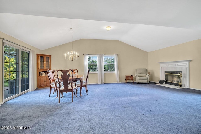 153 Lloyd Rd, Matawan, NJ 07747 - carpeted dining room with lofted ceiling, a chandelier, and a high end fireplace