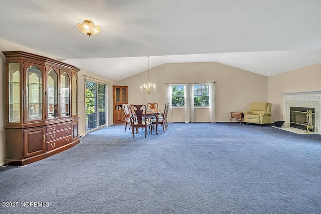 153 Lloyd Rd, Matawan, NJ 07747 - dining room with a chandelier, lofted ceiling, carpet floors, healthy amount of natural light, and a fireplace
