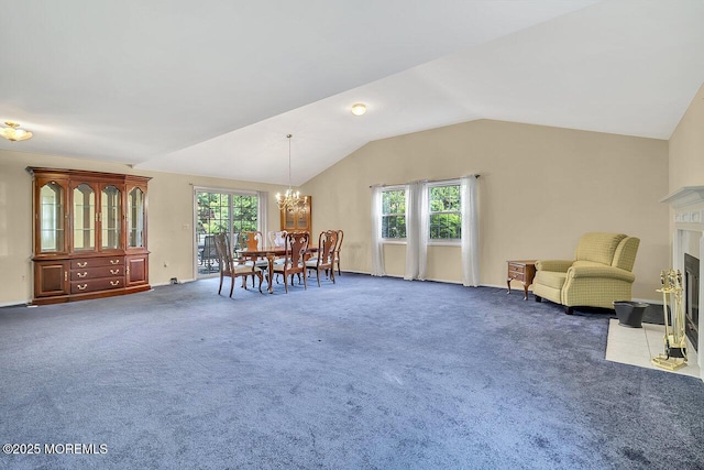 153 Lloyd Rd, Matawan, NJ 07747 - dining room with vaulted ceiling, a chandelier, carpet, and a high end fireplace