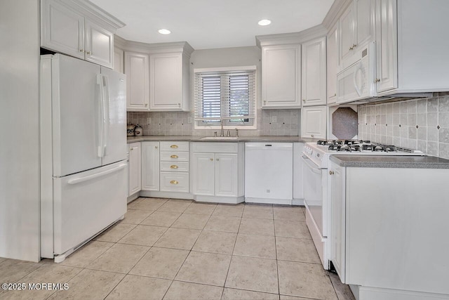 153 Lloyd Rd, Matawan, NJ 07747 - kitchen featuring white appliances, tasteful backsplash, white cabinets, light tile patterned floors, and recessed lighting