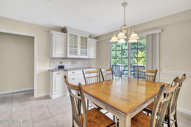 153 Lloyd Rd, Matawan, NJ 07747 - dining space with a chandelier and light tile patterned flooring