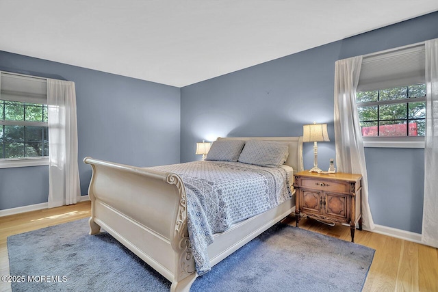 153 Lloyd Rd, Matawan, NJ 07747 - bedroom featuring wood finished floors and baseboards