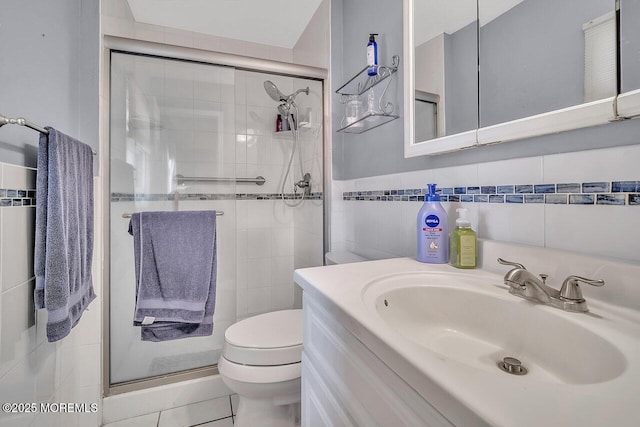 153 Lloyd Rd, Matawan, NJ 07747 - bathroom with a shower stall, vanity, and tile walls