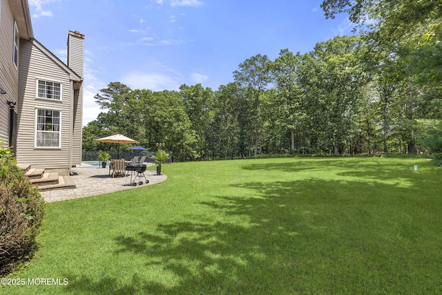 23 Emma Ln, Jackson, NJ 08527 - view of grassy yard featuring a patio area