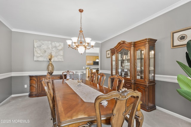 23 Emma Ln, Jackson, NJ 08527 - dining area with light colored carpet, a chandelier, and ornamental molding
