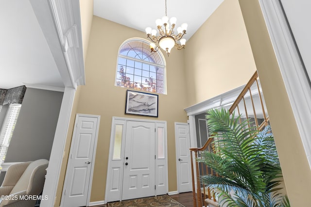 23 Emma Ln, Jackson, NJ 08527 - foyer entrance with a chandelier and dark wood-style flooring