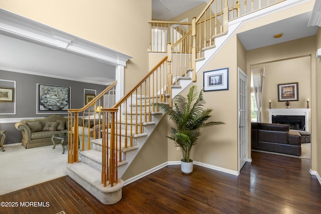 23 Emma Ln, Jackson, NJ 08527 - stairway featuring wood finished floors, a high ceiling, and a fireplace