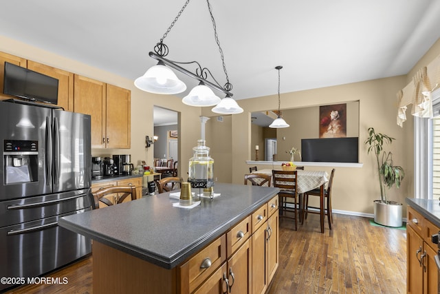 23 Emma Ln, Jackson, NJ 08527 - kitchen featuring stainless steel fridge with ice dispenser, dark countertops, dark wood-style floors, a center island, and brown cabinetry