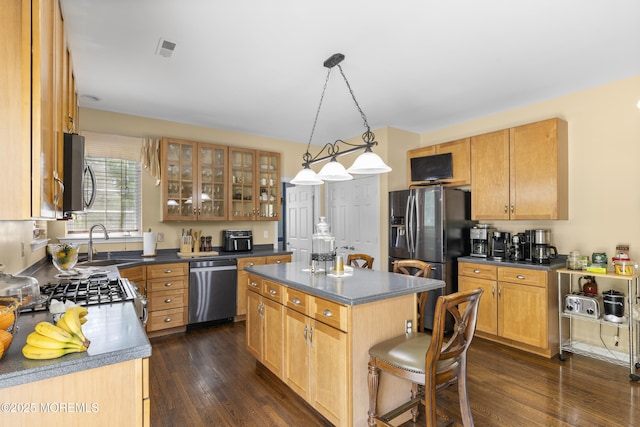 23 Emma Ln, Jackson, NJ 08527 - kitchen with stainless steel appliances, dark countertops, dark wood-style floors, and glass insert cabinets