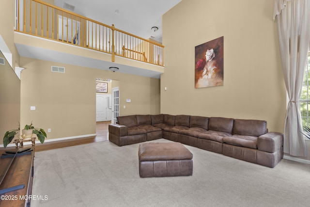 23 Emma Ln, Jackson, NJ 08527 - living room with a high ceiling and carpet flooring