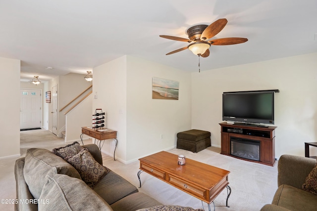1 Maywood Run, Tinton Falls, NJ 07753 - living area featuring a ceiling fan, light carpet, and stairs
