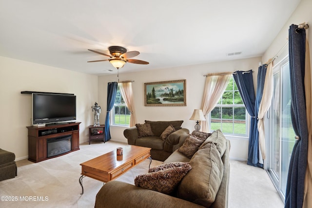 1 Maywood Run, Tinton Falls, NJ 07753 - living room featuring light carpet and ceiling fan