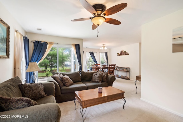 1 Maywood Run, Tinton Falls, NJ 07753 - living area featuring a ceiling fan and light colored carpet