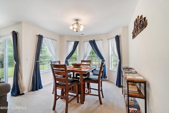1 Maywood Run, Tinton Falls, NJ 07753 - dining area with light carpet and a chandelier