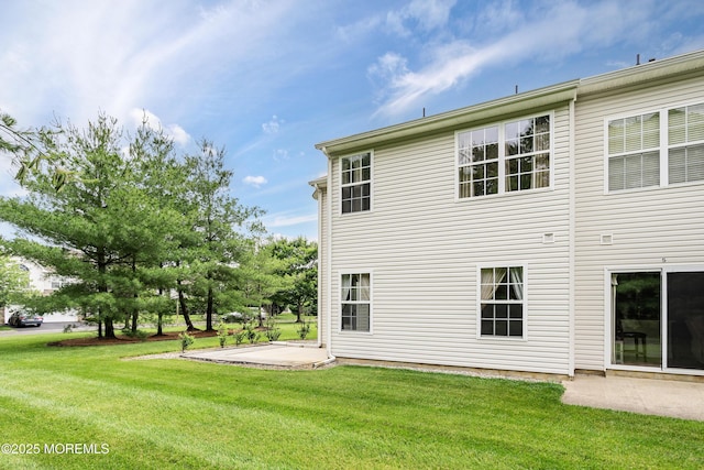1 Maywood Run, Tinton Falls, NJ 07753 - back of property with a patio area and a yard