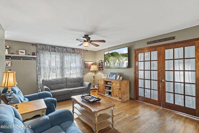 1172 Laurel Dr, Toms River, NJ 08753 - living room with a ceiling fan, hardwood / wood-style flooring, french doors, and a baseboard radiator