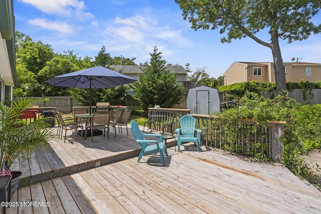 1172 Laurel Dr, Toms River, NJ 08753 - deck featuring a storage shed, outdoor dining space, and a fenced backyard