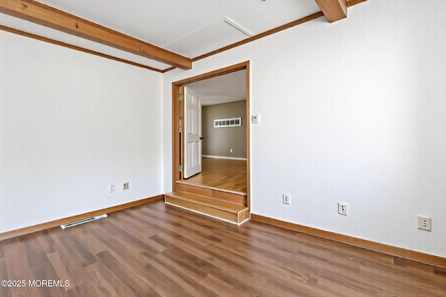 1172 Laurel Dr, Toms River, NJ 08753 - spare room featuring wood finished floors and beam ceiling