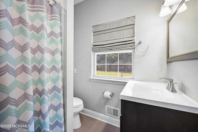 201 Manfre Ct, Freehold, NJ 07728 - bathroom with baseboards, vanity, toilet, a shower with curtain, and wood finished floors